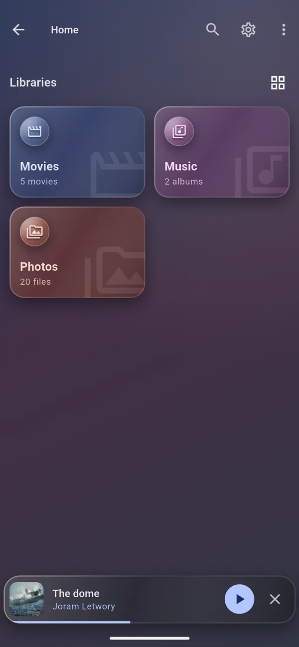 OwnMedia: the libraries of a home server as glass tiles, with the mini player